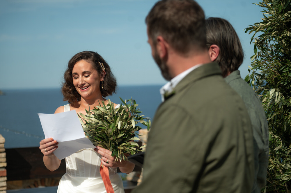 Lois and Nathan during their wedding ceremony at Villa Delenia